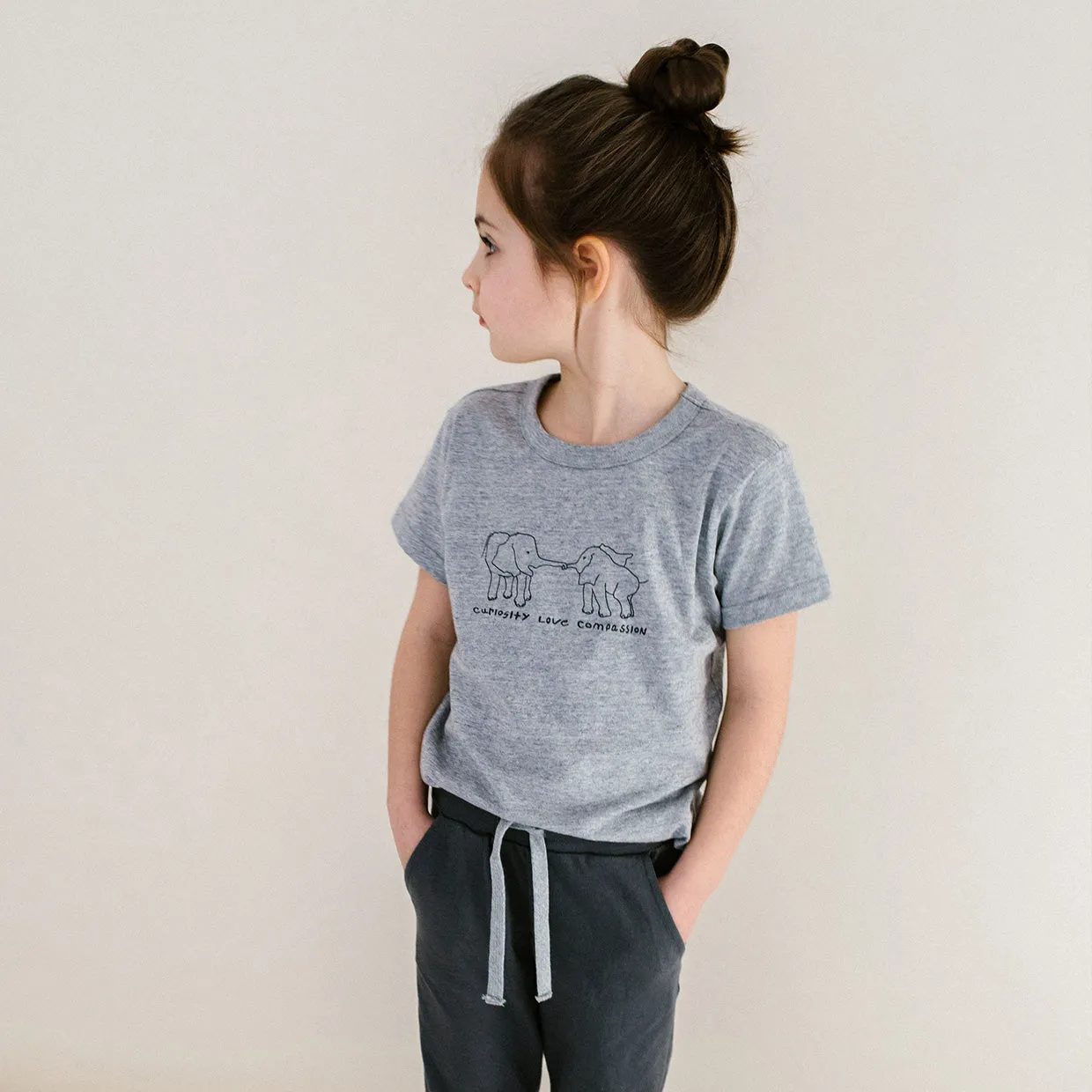 'curiosity love compassion' tee