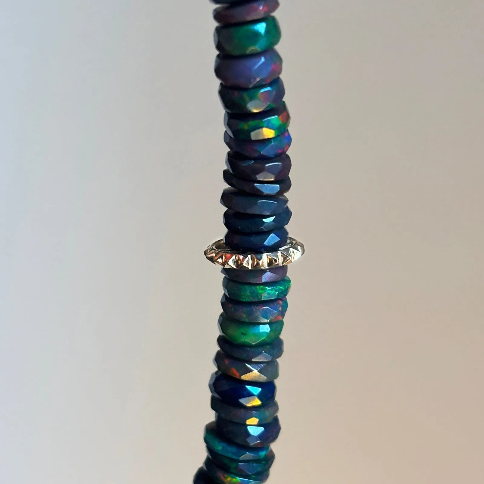 Faceted Black Opal Heishi with Gold Beads