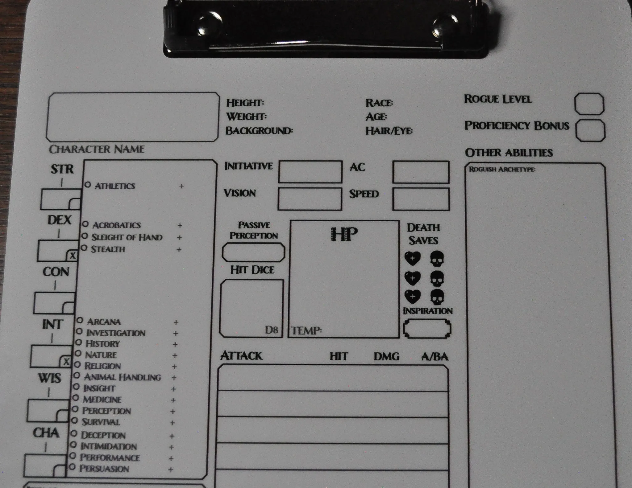 Rogue Character Sheet on a dry erase clipboard